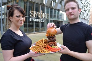 Lindsay White and Adam Richards with Smoke Barbeque's eating challenge at Approach PR, award winning agency from Ilkley, West Yorkshire